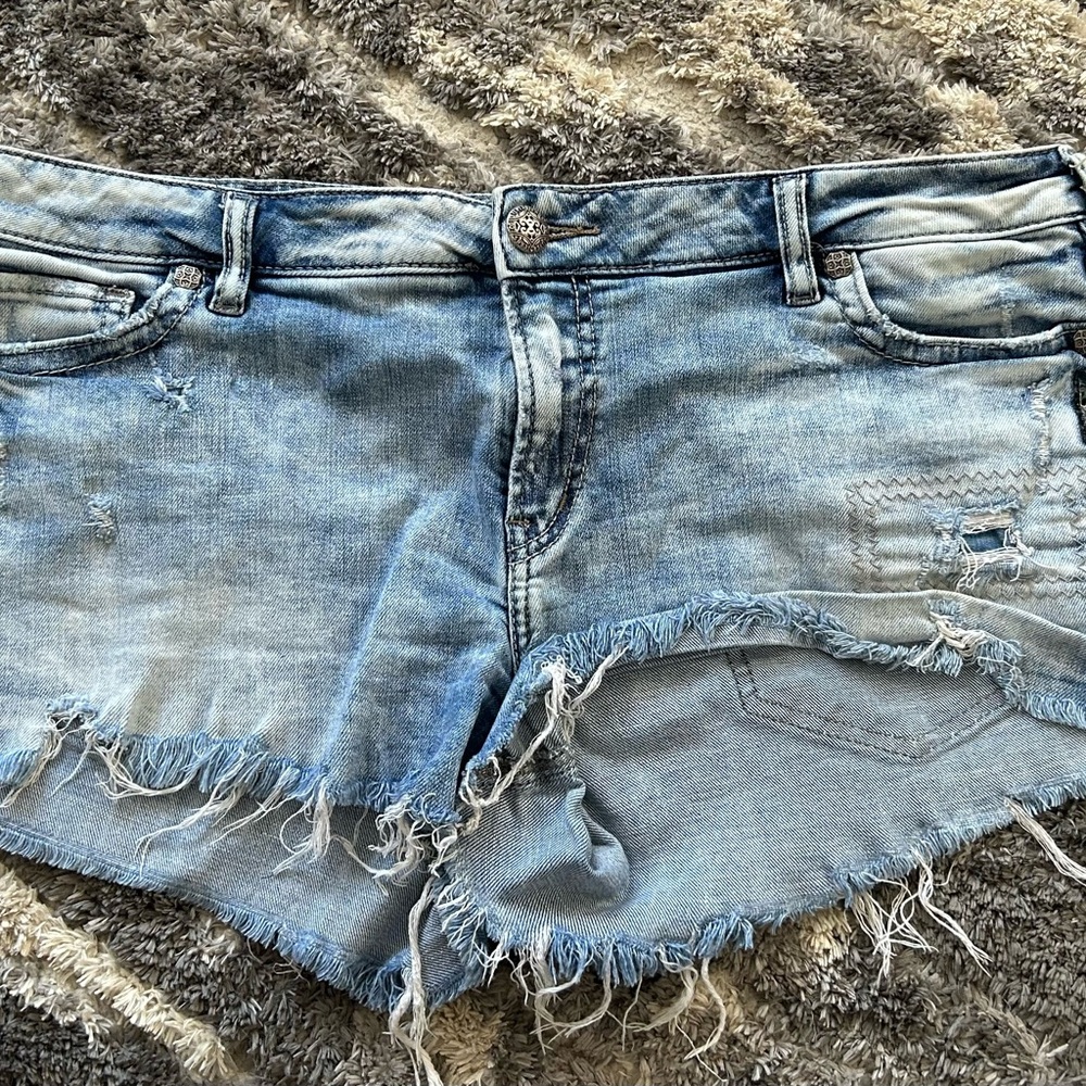 #66 Silver Jeans Light Blue Distressed Shorts